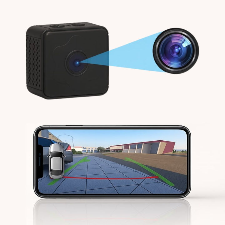 Petit boîtier cubique noir avec zoom sur son objectif, au-dessus d'un smartphone affichant la vue arrière avec lignes de guidage de stationnement. 2
