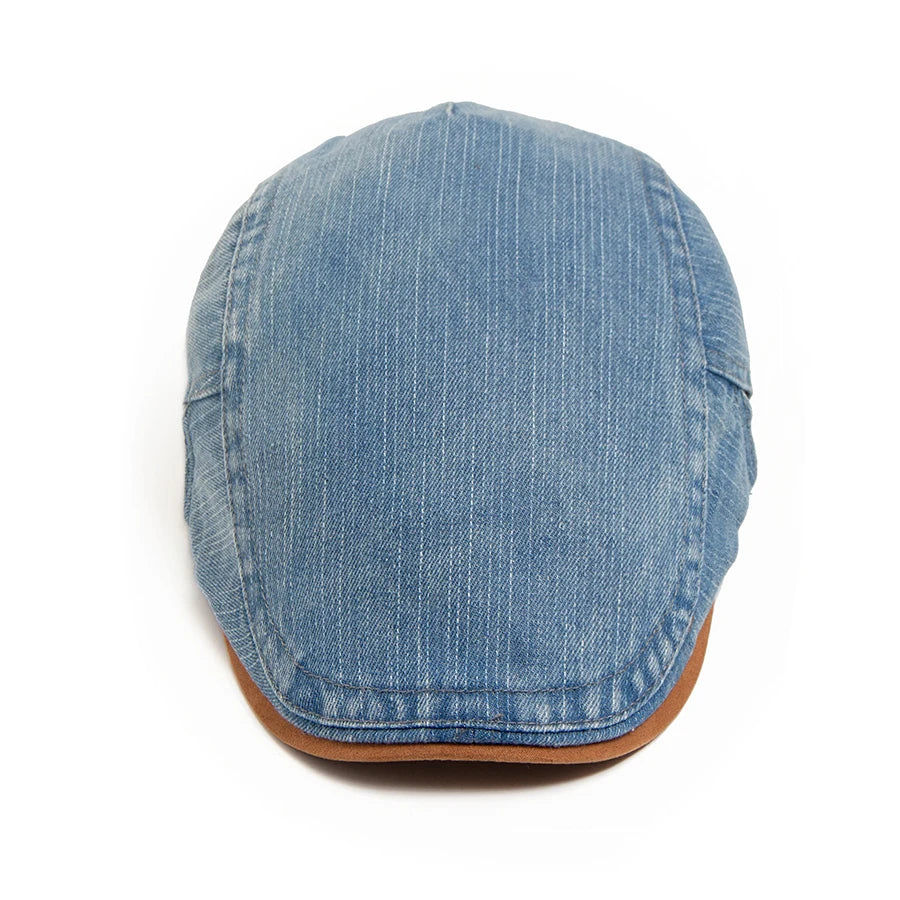 Casquette en denim bleu rayé vue de face sur fond blanc, avec le bord de visière brun visible en bas. 11