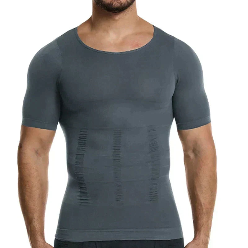 Homme vu de face portant le haut de compression gris, avec fines bandes de maintien visibles sur l'abdomen. 6