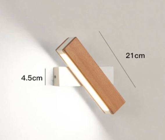 Applique pivotante à support blanc avec cotes indiquées, barre en bois inclinée et bande lumineuse allumée. 4