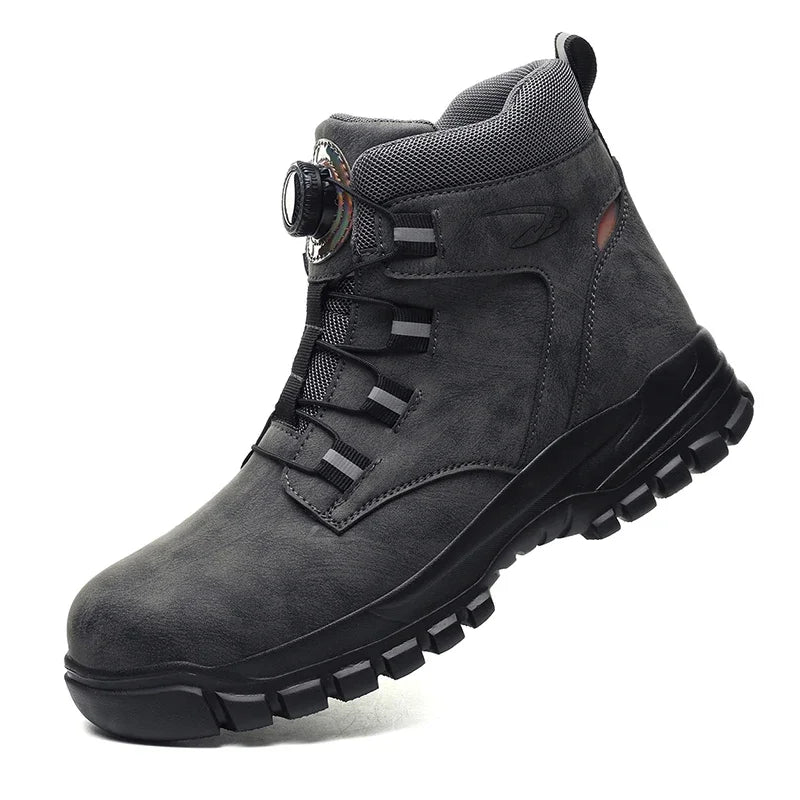 Botte montante gris anthracite, vue de profil, avec molette rotative, sangles réfléchissantes et semelle noire crantée 7