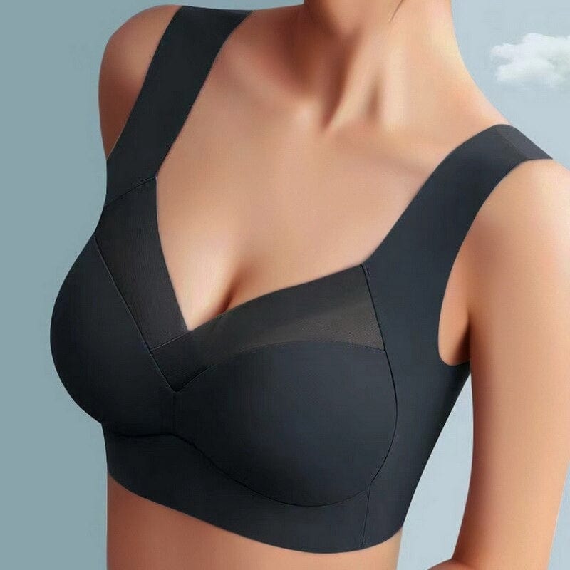 Soutien-gorge noir porté par un modèle, vue de face, avec empiècement en voile transparent sur le décolleté 1