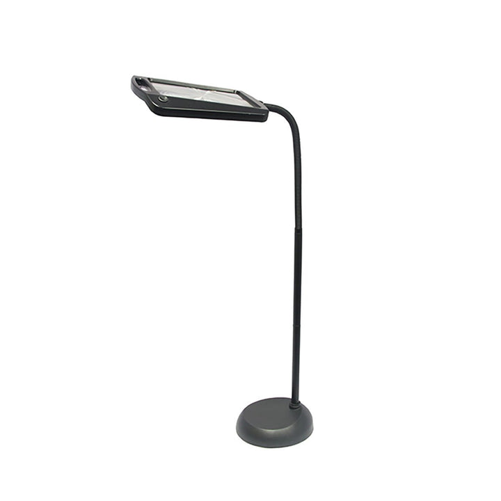 Lampe noire sur pied rond, vue de profil avec col flexible courbé et large loupe rectangulaire 1