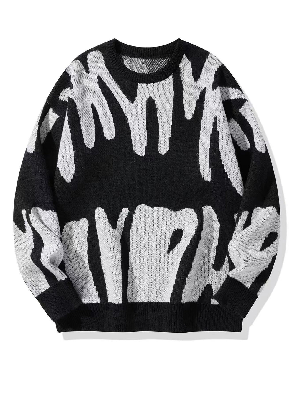 Pull en maille noir à grand motif abstrait blanc cassé, vu de face, à plat 2
