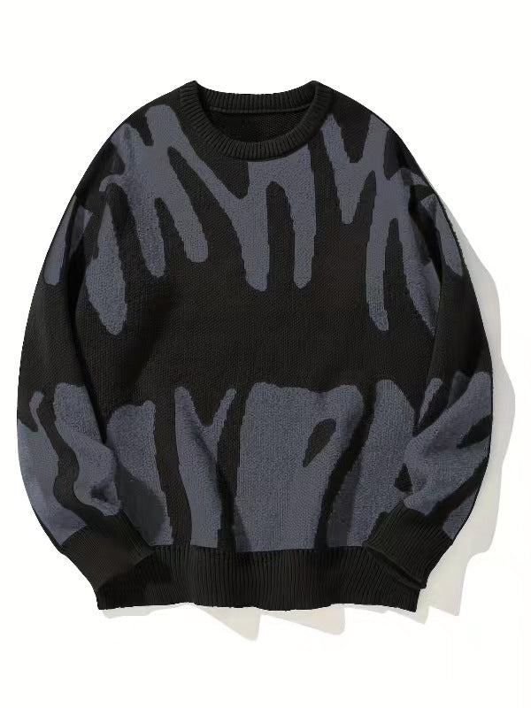 Pull en maille noir à motif abstrait gris, vu de face, à plat 4