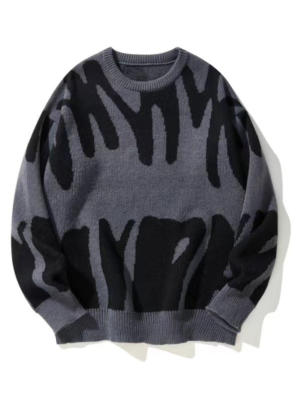 Pull en maille gris foncé à motif abstrait noir, vu de face, à plat 1
