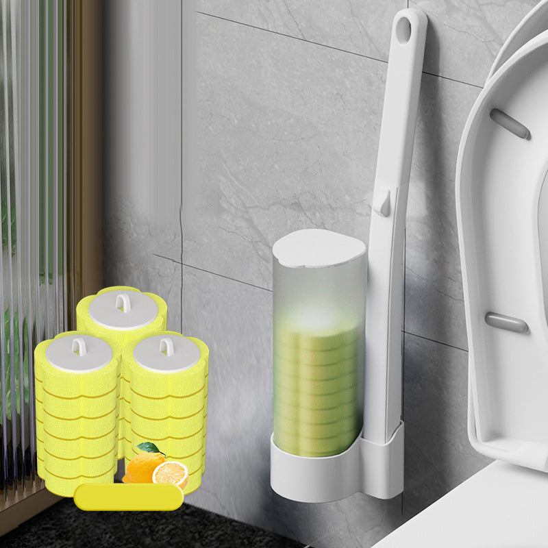 Distributeur mural de têtes jaunes avec trois piles de recharges jaunes, un citron et une pastille jaune au premier plan. 19