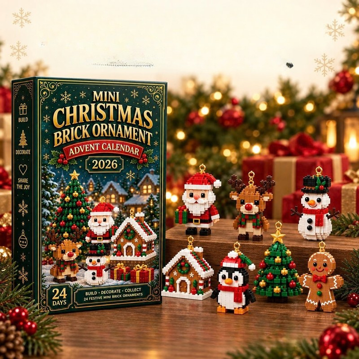 Boĩte du calendrier et six figurines en briques sur un socle en bois : père NoĂ«l, renne, bonhomme de neige, maison, pingouin, sapin, pain d'Ă©pice. 9