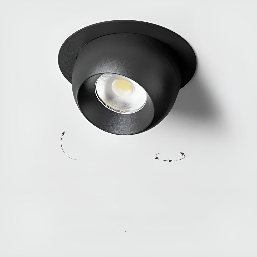 Spot noir encastré à tête sphérique allumé, avec des flèches indiquant son orientation et sa rotation possibles 5