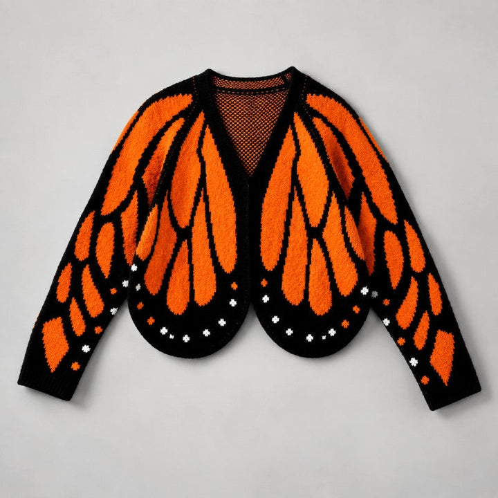 Version du cardigan aux ailes de papillon orange vif sur fond noir, vue à plat 2
