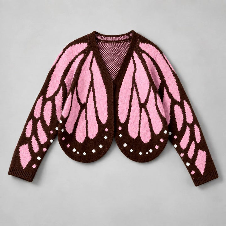 Version du cardigan aux ailes de papillon roses sur fond brun foncé, vue à plat 3