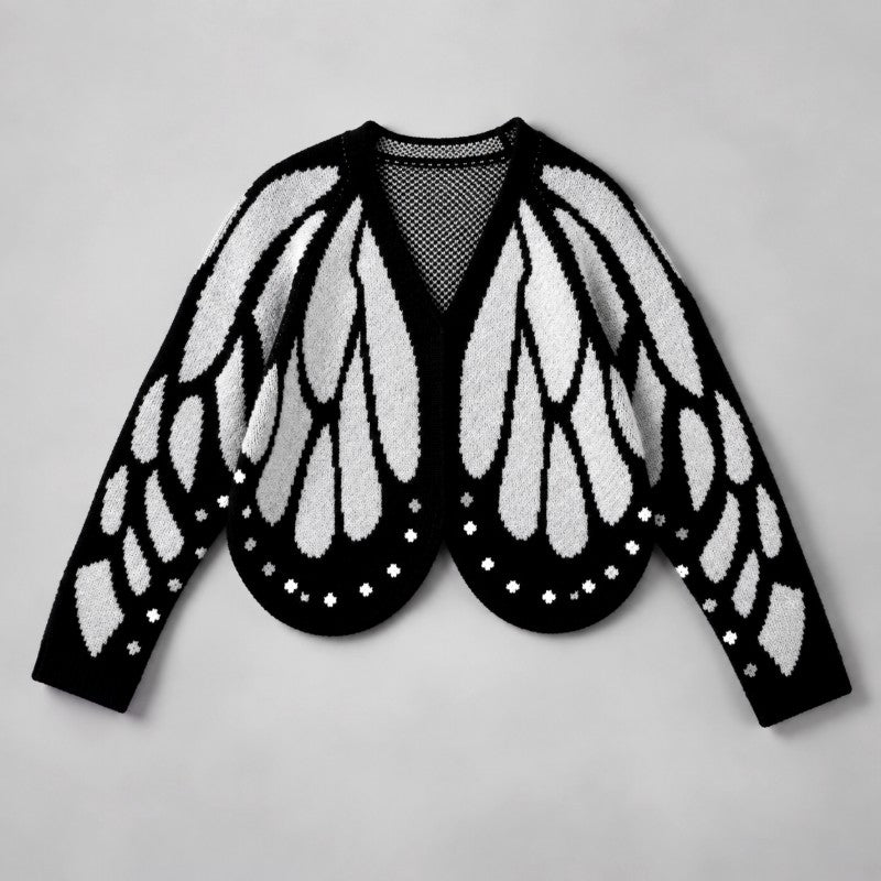 Version du cardigan aux ailes de papillon blanches sur fond noir, vue à plat 4