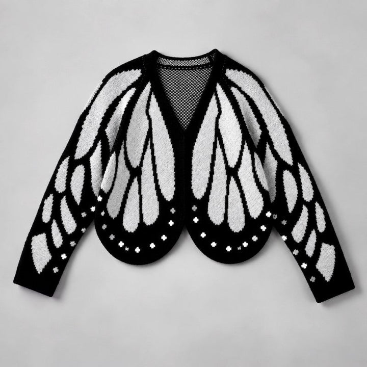 Version du cardigan aux ailes de papillon blanches sur fond noir, vue à plat 4