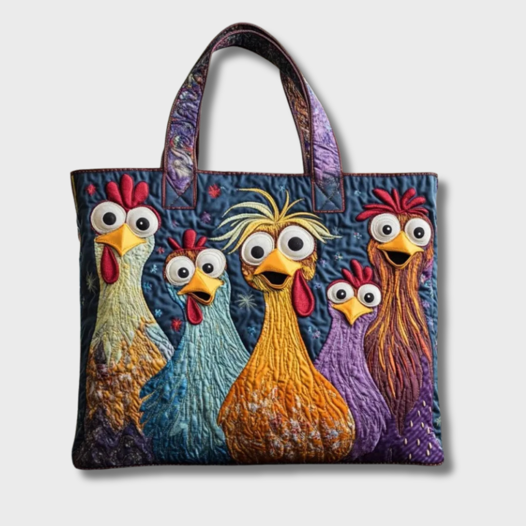Sac matelassé à deux anses, vu de face sur fond clair, avec cinq poules brodées aux yeux ronds. 2
