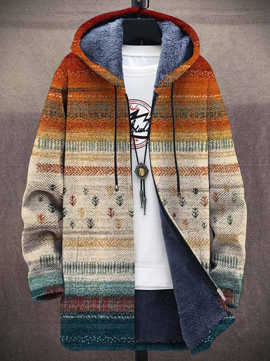 Vue de face du cardigan zippé à capuche, doublure peluche bleue apparente, motifs de sapins sur rayures orange et beige 1