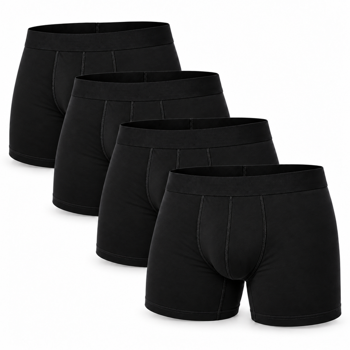 Lot de quatre boxers noirs superposés en décalé, ceinture élastique unie et coutures apparentes. 12