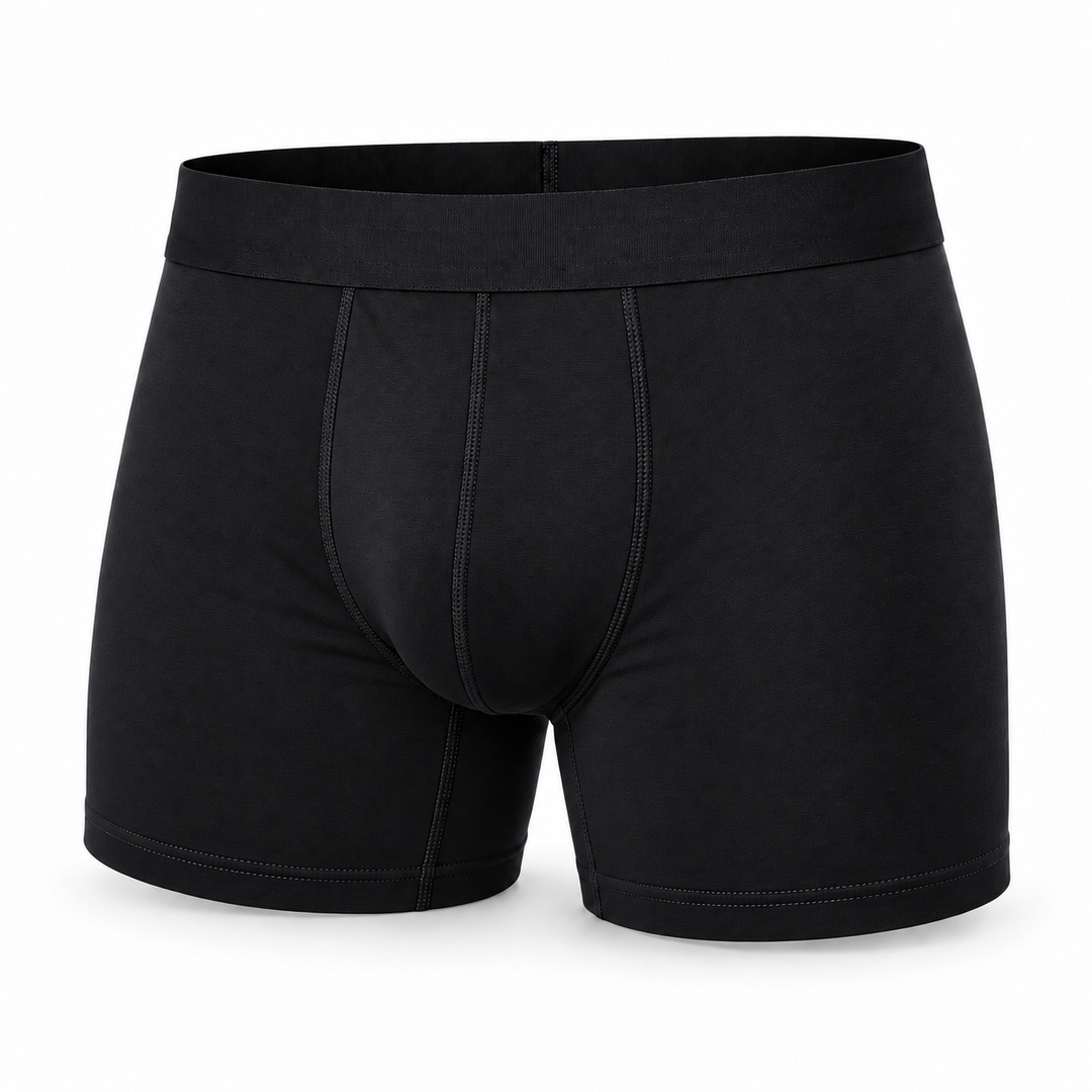 Boxer noir seul, vue de face, avec ceinture élastique unie et coutures de l'entrejambe visibles. 13