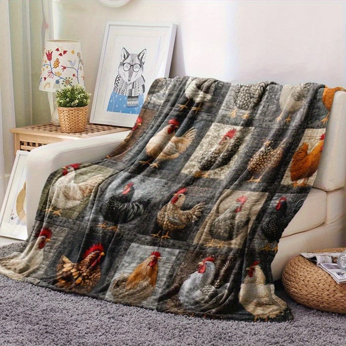 Couverture à poules grises et brunes déployée sur un canapé dans un salon 14