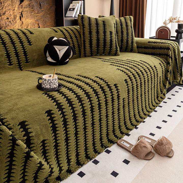 Canapé avec housse vert olive à rayures noires en zigzag, deux coussins assortis et chaussons 11