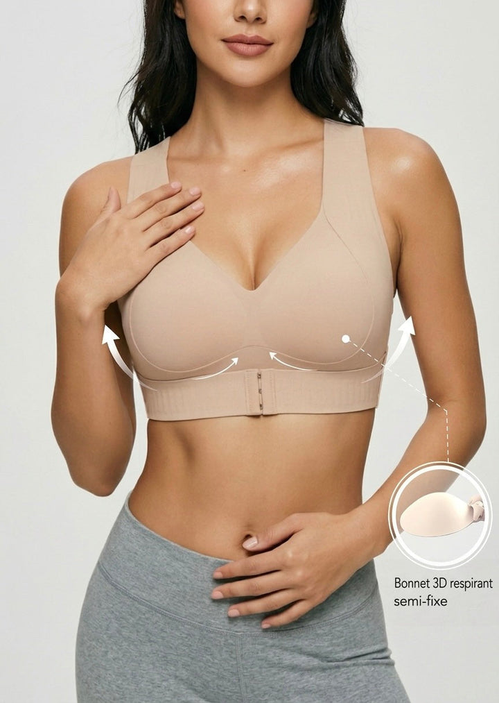 Mannequin en soutien-gorge beige et legging gris, avec flèches de maintien et médaillon sur la coque légère et respirante. 19