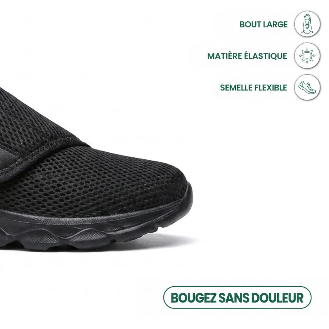 Gros plan sur l'avant de la chaussure noire, bout large et mesh élastique, avec trois icônes de confort. 14