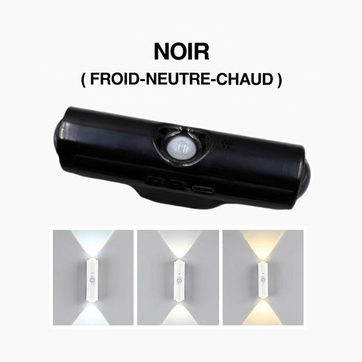 Lampe noire cylindrique avec détecteur de mouvement, et trois teintes de lumière blanche projetées sur le mur 3