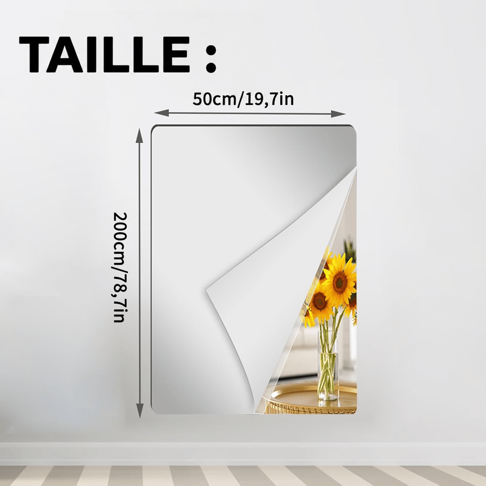Feuille miroir rectangulaire très haute collée au mur, coin décollé sur un bouquet de tournesols, avec cotes de largeur et hauteur. 13