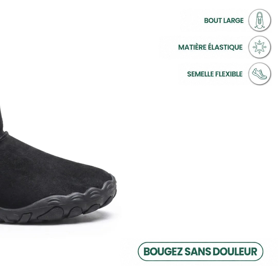 Gros plan sur le bout large de la botte noire et sa semelle flexible, avec pictogrammes 14