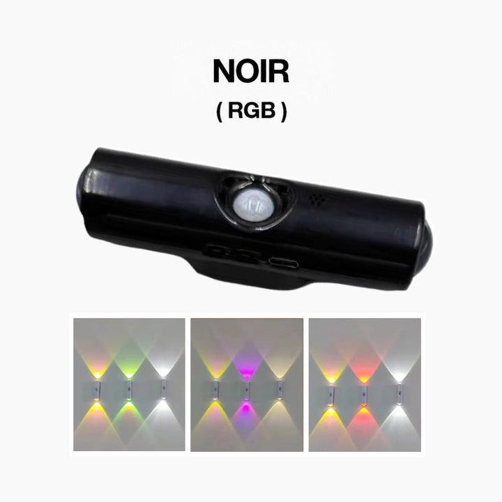 Lampe noire cylindrique avec détecteur de mouvement, et trois exemples d'éclairage multicolore projetés sur le mur 4