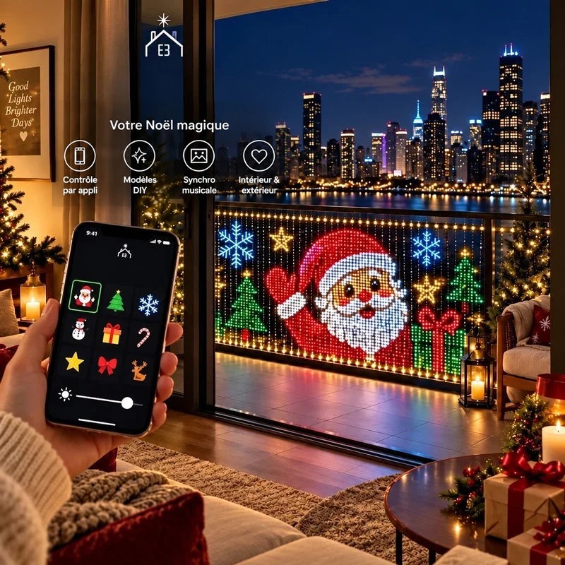 Main tenant un smartphone qui pilote le rideau lumineux, motif de Père Noël sur la baie vitrée 2