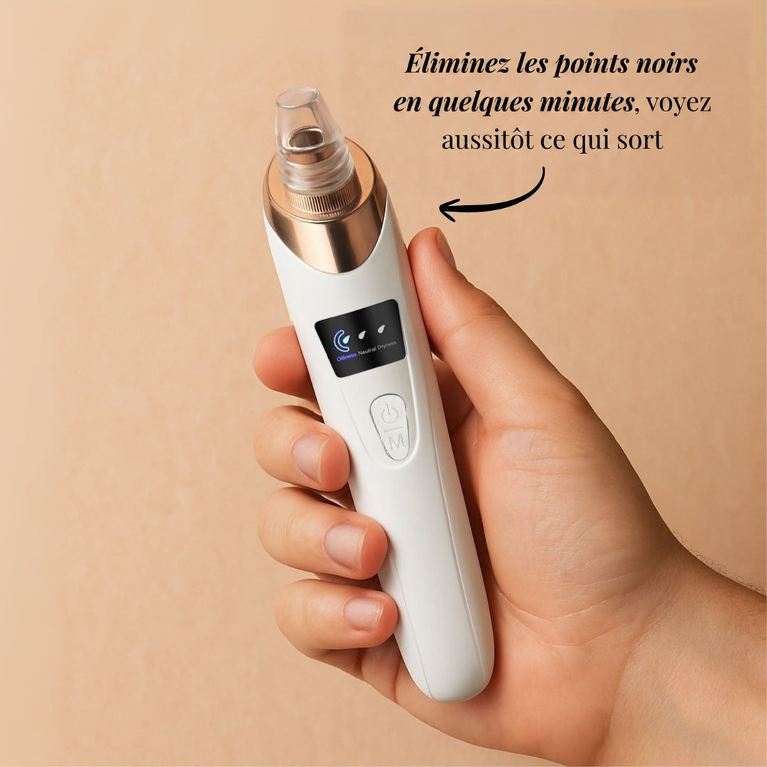 Appareil blanc à embout transparent et collerette dorée, tenu en main, écran d'affichage et bouton visibles 1