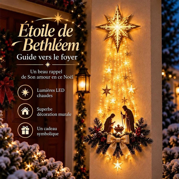 Étoile dorée lumineuse et scène de nativité fixées au mur d'un porche enneigé, guirlandes lumineuses en cascade 1
