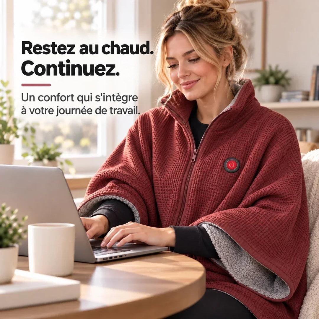Femme travaillant sur un ordinateur portable à une table, portant le poncho rouge à col montant 11