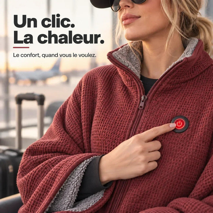 Gros plan sur le bouton marche-arrêt rouge du poncho bordeaux, doigt appuyé, doublure grise douce visible 9