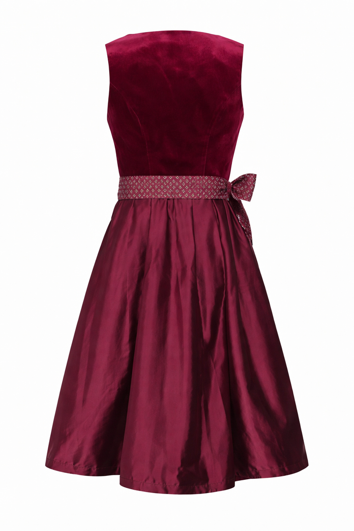 Dirndl vu de dos avec la ceinture du tablier nouée en un nœud sur le côté, jupe plissée évasée. 5