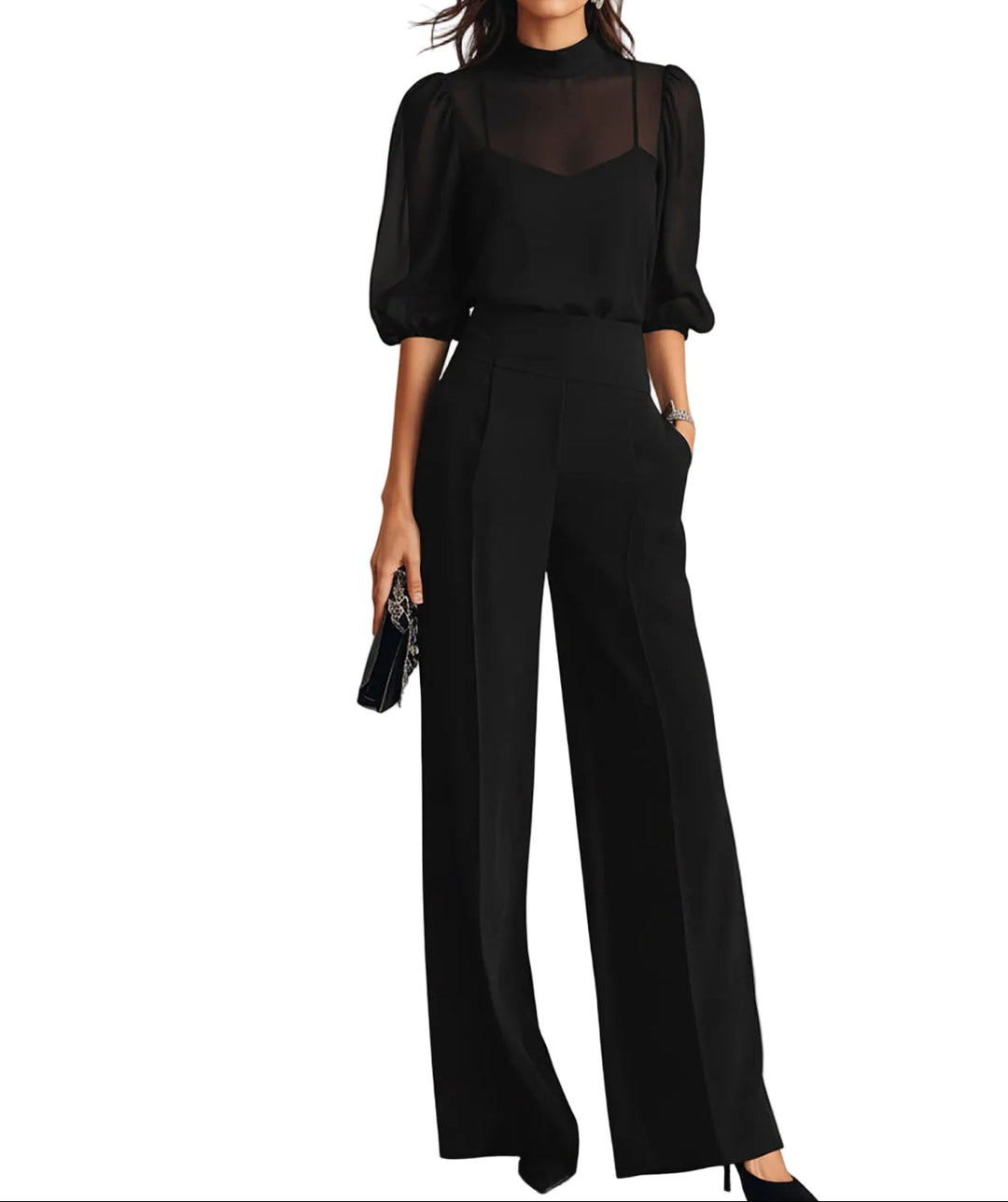 Ensemble noir porté par un mannequin sur fond blanc : haut transparent à manches bouffantes, caraco et pantalon large taille haute. 1
