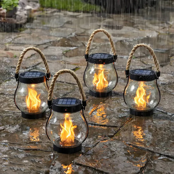 Quatre lanternes allumées sur des dalles de pierre mouillées sous la pluie 10