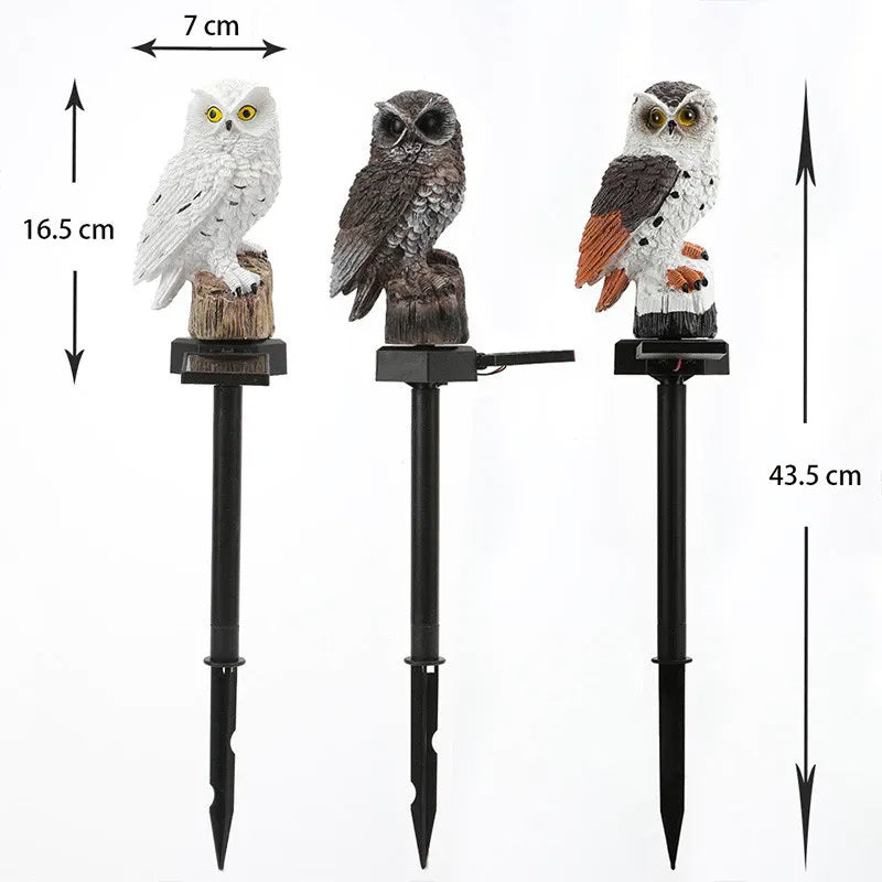 Trois modèles de hiboux sur piques noirs côte à côte avec cotes indiquées: environ 16,5 cm pour le hibou, 43,5 cm au total. 12