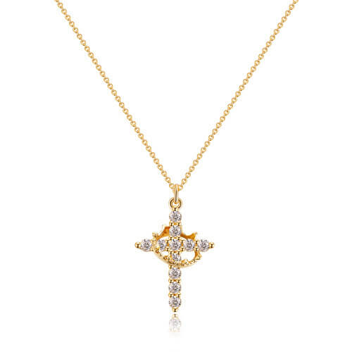 Collier dorÃ© posÃ© Ã  plat, pendentif en forme de croix ornÃ©e de pierres claires avec une petite couronne au centre. 2