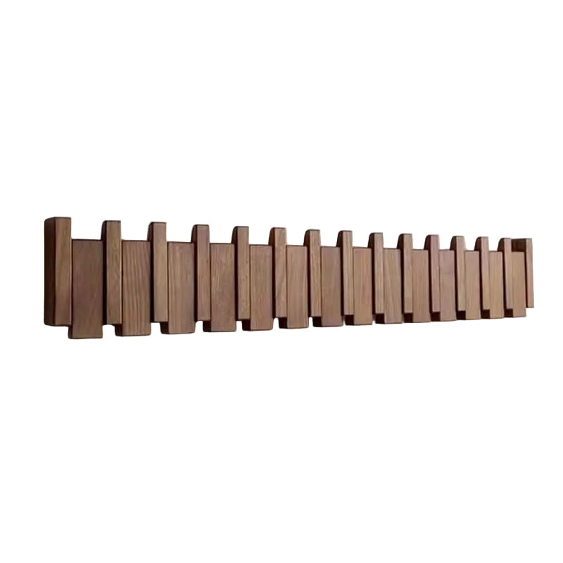 Longue barre murale en bois brun foncé aux lattes décalées comme des touches de piano, présentée seule sur fond blanc. 1