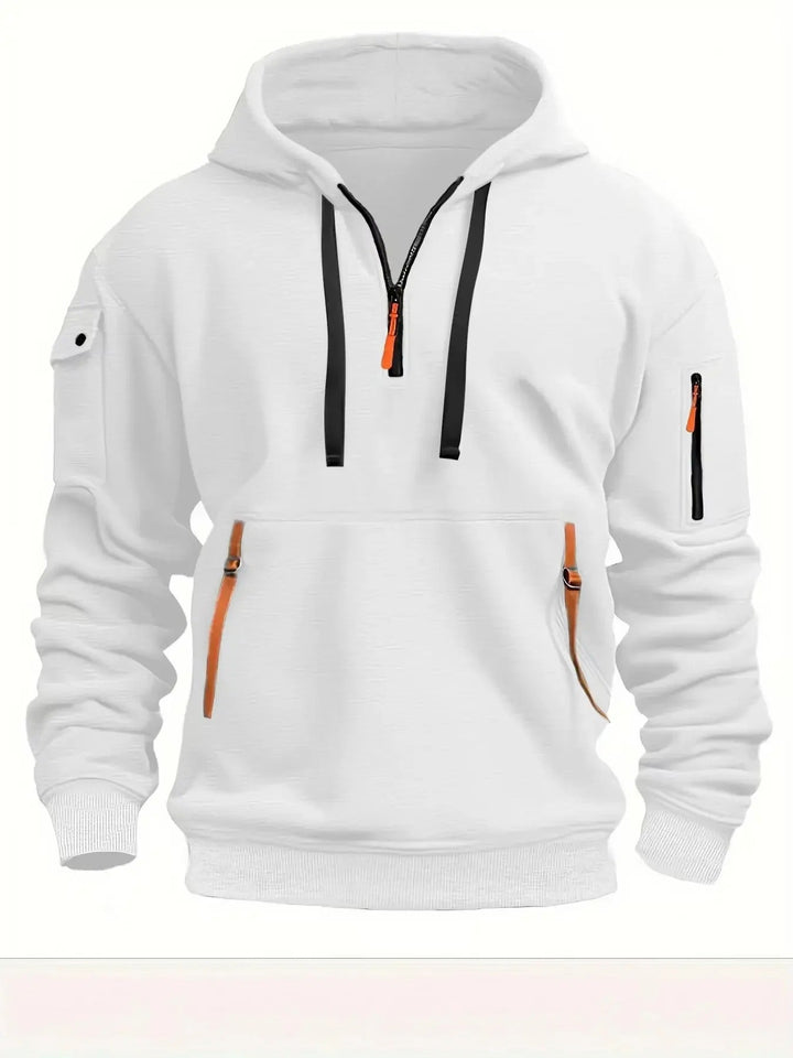 Vue de face du coloris blanc, avec cordons de capuche noirs et détails orange sur les zips des poches. 3