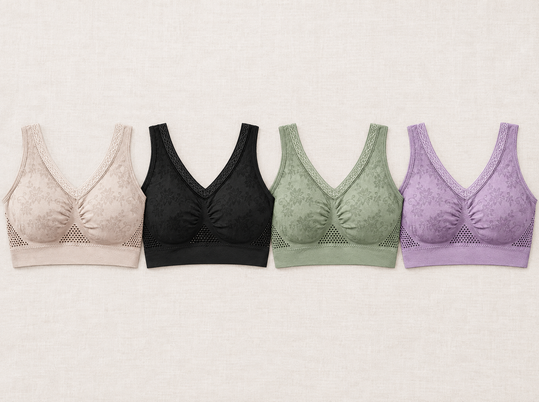 Quatre soutiens-gorge alignés côte à côte en beige, noir, vert et violet, avec le même motif floral 2