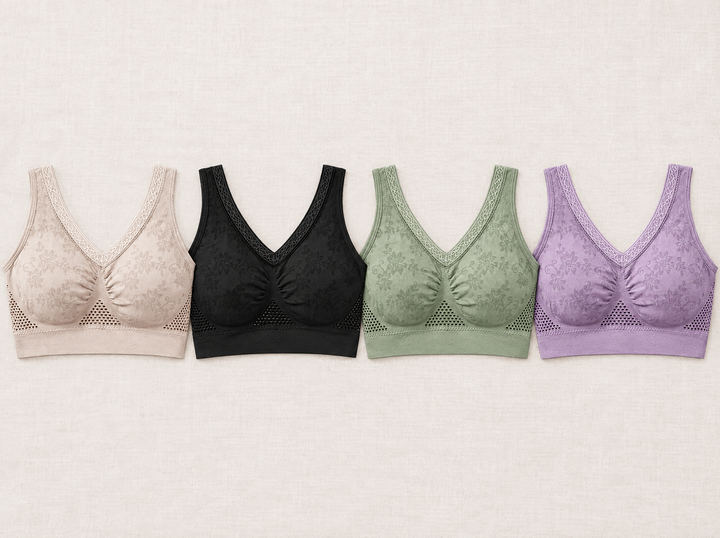 Quatre soutiens-gorge alignés côte à côte en beige, noir, vert et violet, avec le même motif floral 2