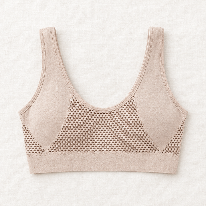 Dos du soutien-gorge beige avec large panneau en mailles ajourées et bretelles larges, posé à plat 8