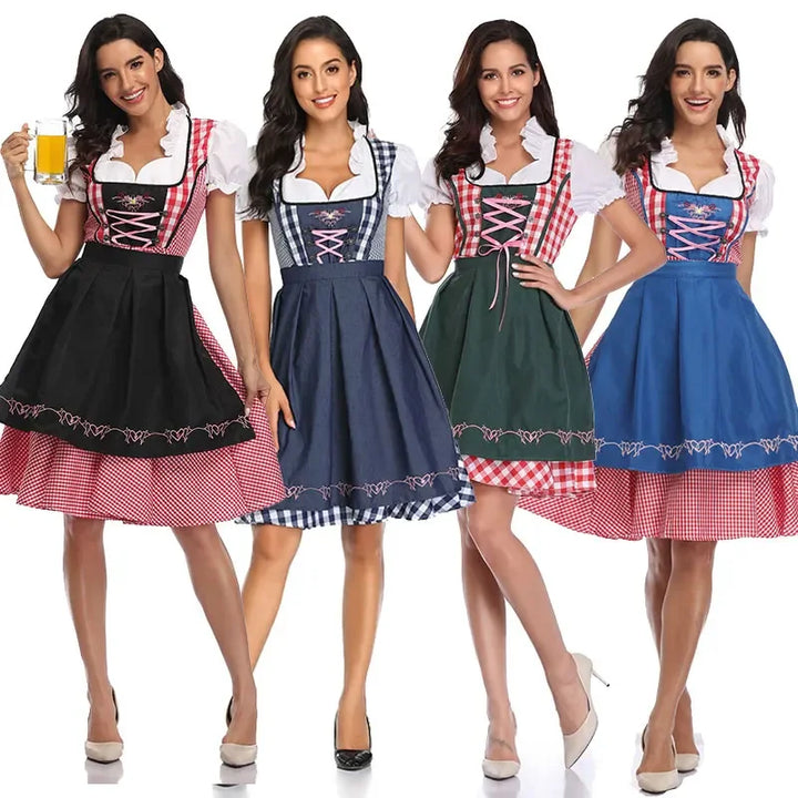 Quatre modèles côte à côte présentant le dirndl en quatre coloris de tablier : noir, bleu marine, vert foncé et bleu roi. 10