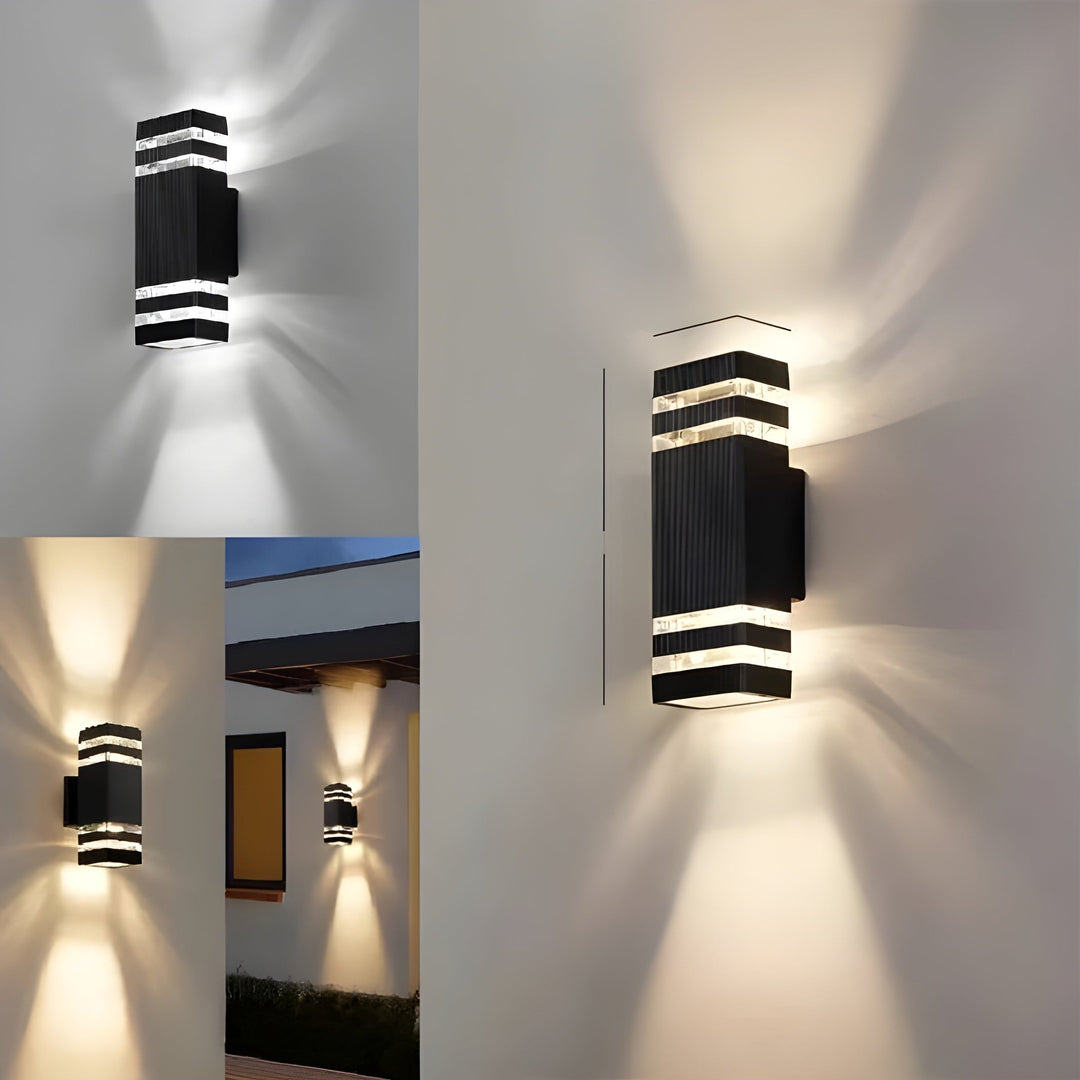 Applique rectangulaire noire à bandes transparentes, allumée, comparant la lumière blanche froide et la lumière blanche chaude, avec une vue sur une façade de n 10