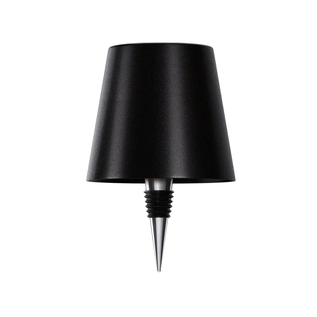 Lampe noire mate avec son bouchon en métal et caoutchouc, présentée seule sur fond blanc. 11