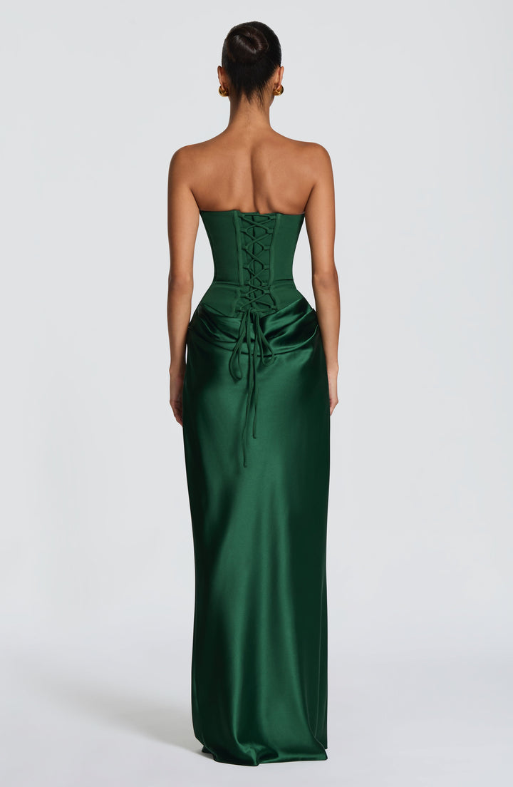 Vue de dos de la robe verte avec lacets croisés du corset et longs liens 30