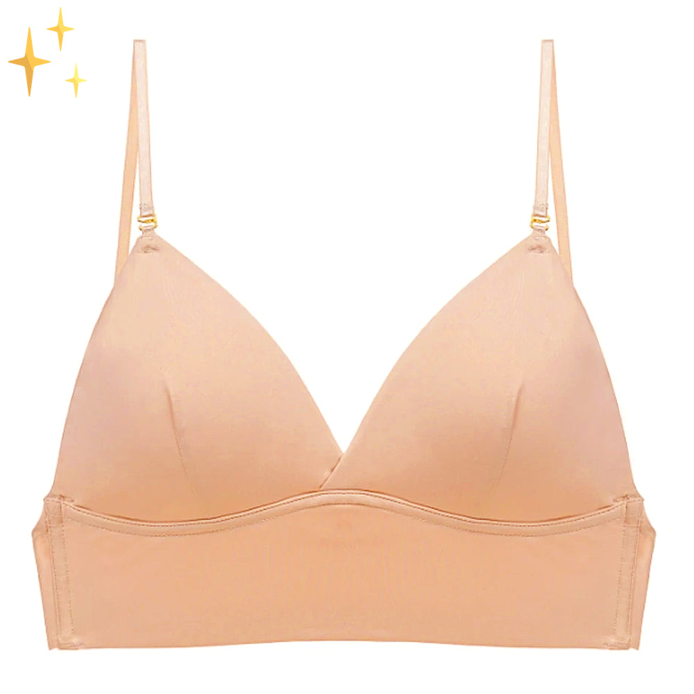Soutien-gorge triangle couleur chair posé à plat, vu de face, avec fines bretelles réglables et bande sous la poitrine lisse. 1