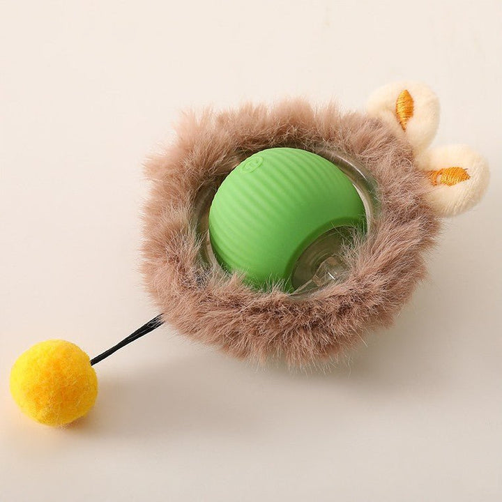 Version pour chat : balle verte entourée d'une couronne de fourrure beige, avec oreilles crème brodées et pompon jaune au bout d'une tige. 13